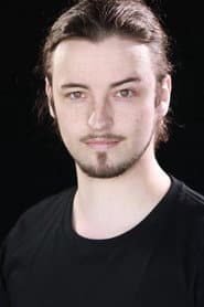 Travis Holian